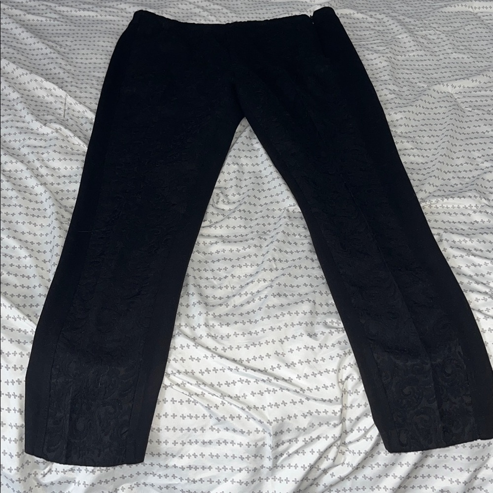 Elegant Black Pants with lace inlay going up the front of both legs.